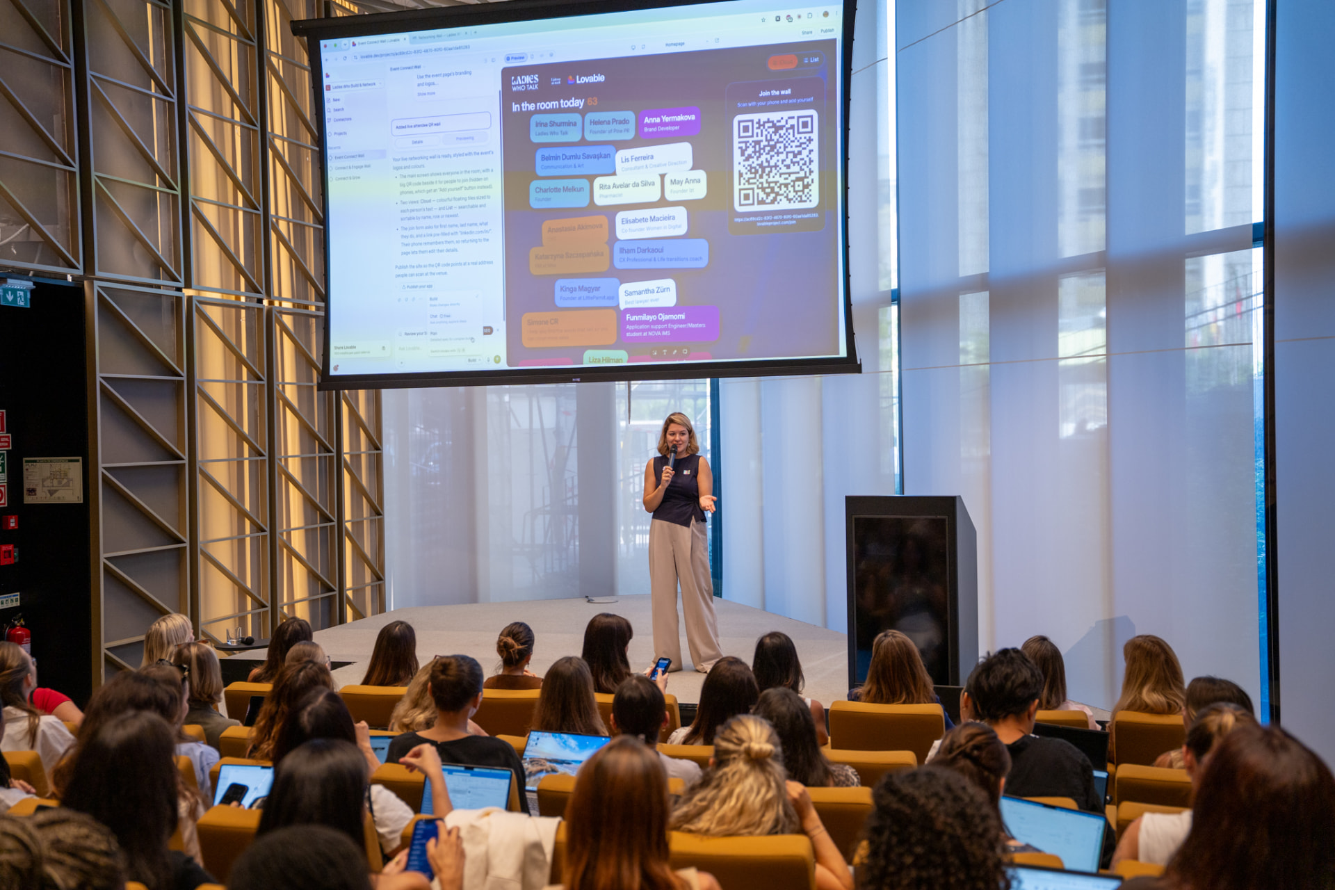 Irina presenting the Lovable event wall to a full room